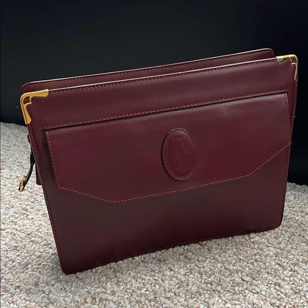Cartier Maroon Leather Clutch with Gold Accents